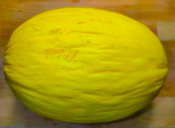 Melon jaune sur fond en bois - 写真・画像