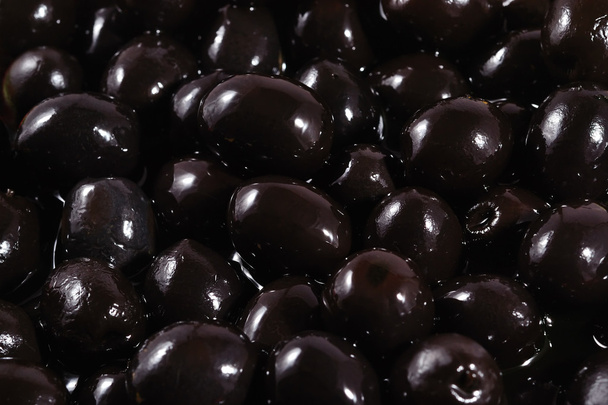 Black olives background - Φωτογραφία, εικόνα