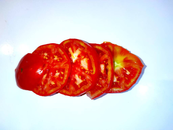 Rondelles tomate fond blanc - Fotó, kép