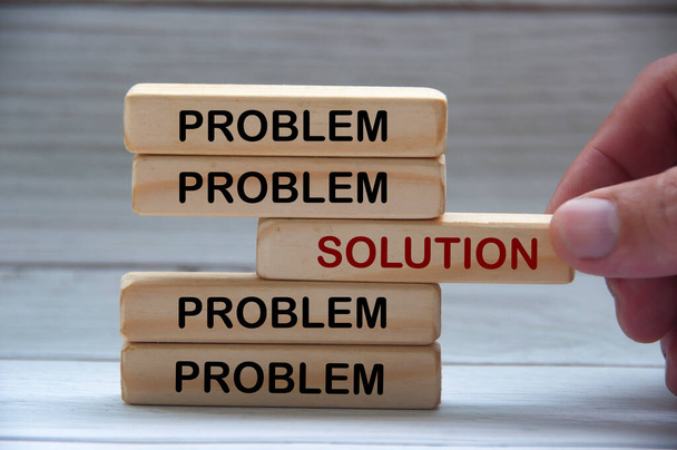 Problem and solution text on wooden blocks. Solution concept - Foto, afbeelding