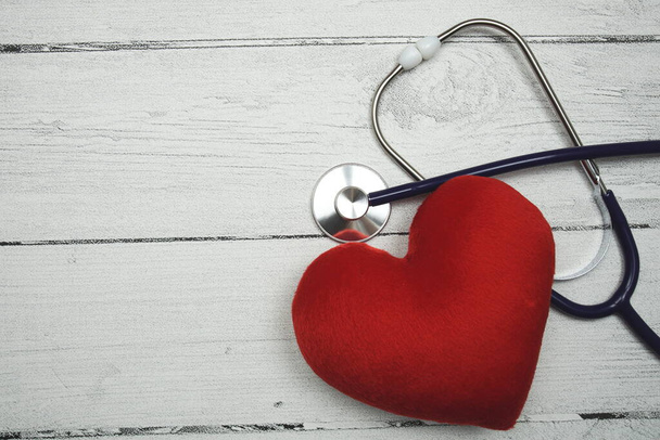 Heart and Stethoscope with space copy on wooden background - Foto, immagini