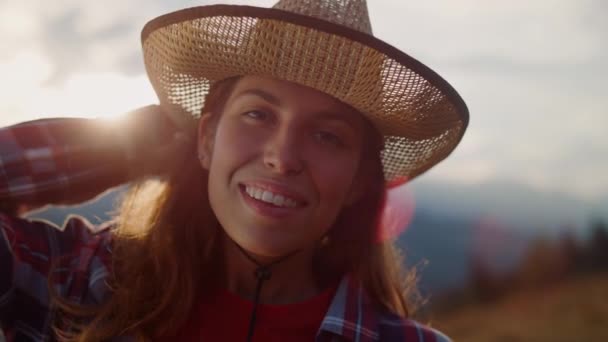 Happy millennial look camera in mountains. Portrait of joyful girl laugh on nature vacation holiday. Young beautiful model posing express pleasure happiness on holiday. Youth beauty leisure concept. - Materiał filmowy, wideo