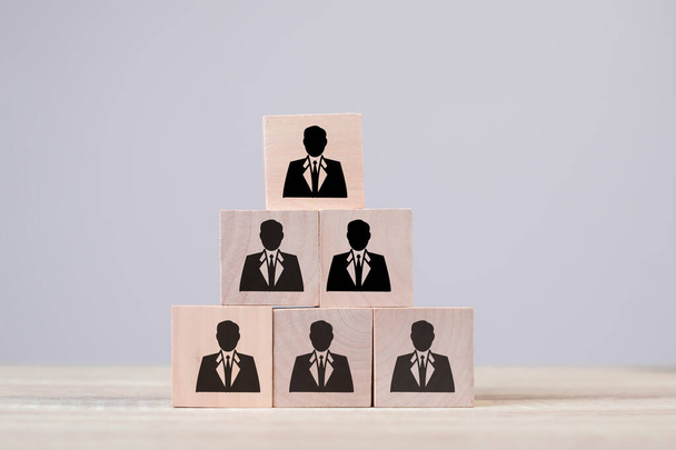 Human resources management and recruitment business building good team, organization concept, solidarity or cooperation in business concept, Person icons on stack wooden cube block  - Foto, imagen