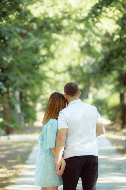 couple in love together holding hands and standing in park  - Photo, Image