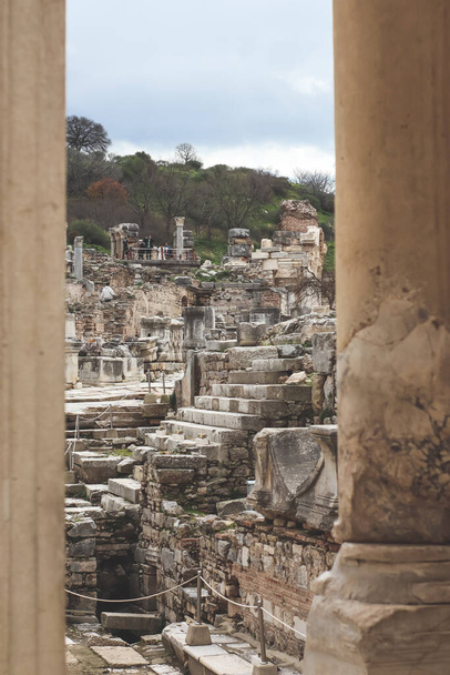 Curetes street with ruins see through columns from the Library of Celsus - Foto, Bild