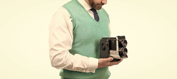 cropped guy with retro camera isolated on white backdrop, photography. - Zdjęcie, obraz