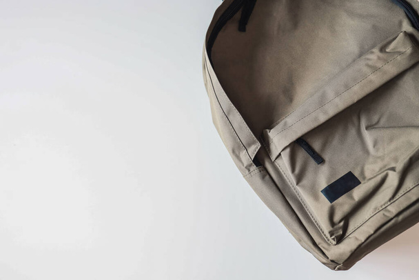 Men's khaki backpack on a white background, space for text. - Foto, Imagem