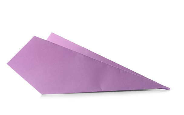 Lilac paper plane on white background - 写真・画像