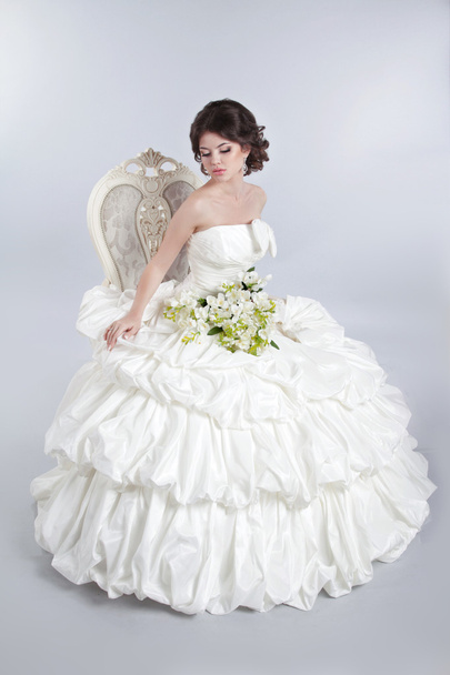 Beautiful attractive bride model wearing in wedding dress with v - Fotografie, Obrázek