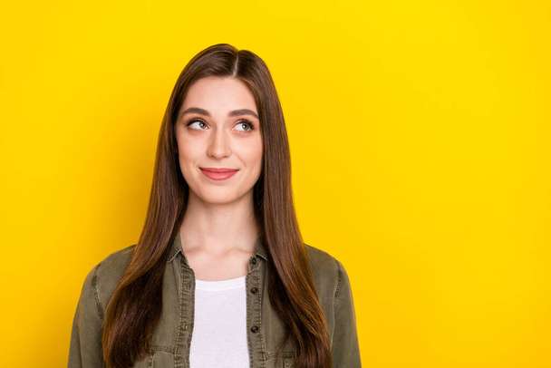 Photo of cheerful dreamy smart adorable female look blank space brainstorming isolated on yellow color background. - Valokuva, kuva