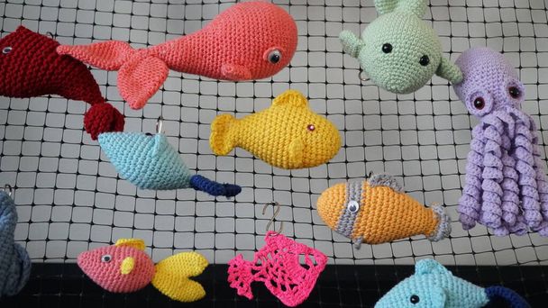 toy fish making with knitting technique - Foto, afbeelding