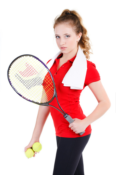 Young girl tennis player resting after a workout. - 写真・画像