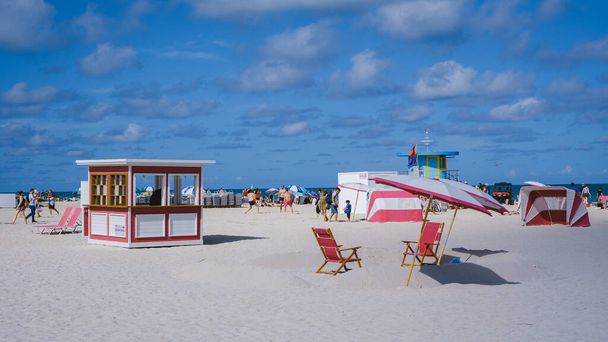 Miami Beach Florida May 2022 colorful beach with umbrellas and beach huts.  - Photo, image