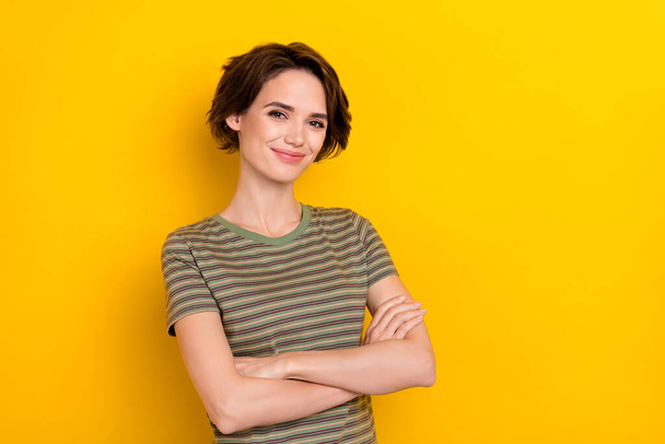 Closeup photo of young attractive girl wear fist up celebrate victory tournament isolated on yellow color background. - Φωτογραφία, εικόνα