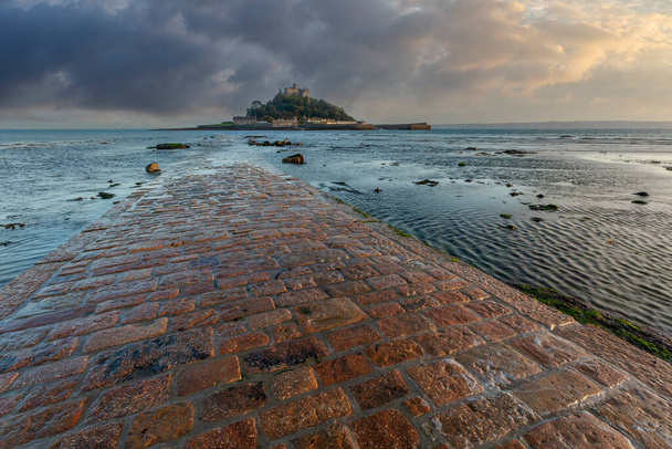 st michaels mount cornwall and flooded causeway at sunset with clearing storm no people - Photo, Image