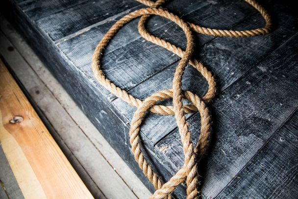 rope on the wooden background - Photo, Image