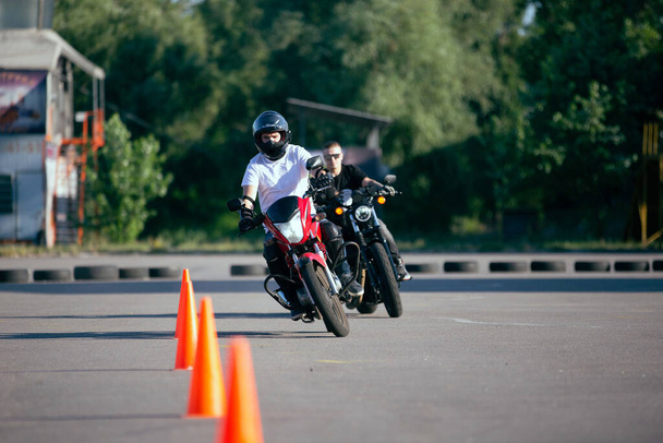 Moto school track driving. A biker on a motorcycle. - Fotoğraf, Görsel