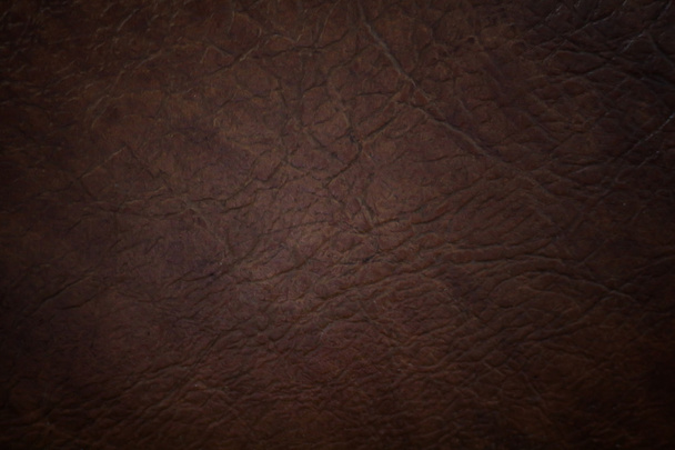 bruin lederen textuur close-up. nuttig als achtergrond voor ontwerp-w - Foto, afbeelding