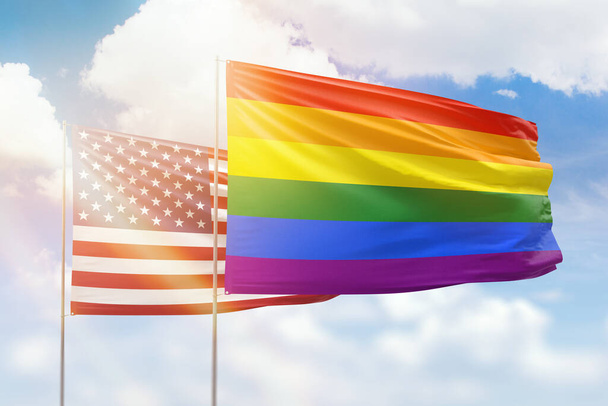 Sunny blue sky and flags of lgbt and usa - Foto, Imagen