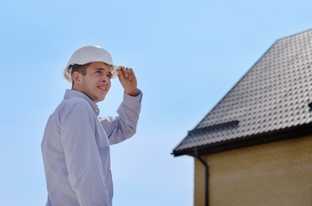 Engineer or building inspector checking a roof - Fotografie, Obrázek