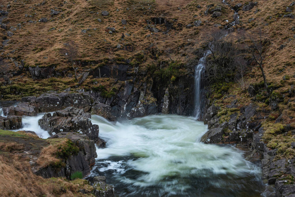 Beautiful Winter landscape image of River Etive and Skyfall Etive Waterfalls in Scottish Highlands - Fotó, kép