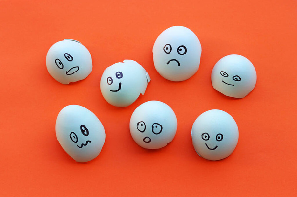 Eggshells with painted faces with different emotions - Foto, Imagen