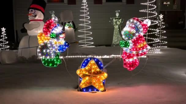 See saw Christmas lighted moving decoration - Footage, Video