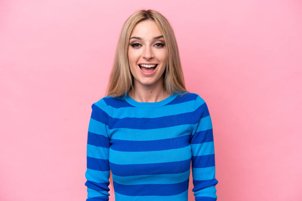 Pretty blonde woman isolated on pink background with surprise facial expression - Foto, afbeelding