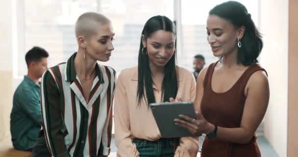 Talking team with tablet planning, thinking and brainstorming ideas for creative startup company in office. Portrait of smiling, confident or happy group of business women meeting together to discuss. - Filmagem, Vídeo