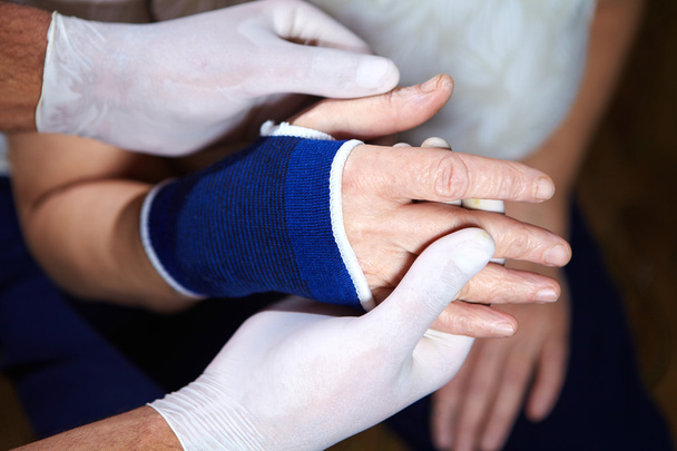 Hand of patient with bandage - Photo, Image