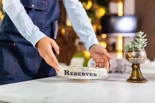 Elegant Restaurant Table Setting Service for Reception with Reserved Card. Restaurant reserved table sign - 写真・画像