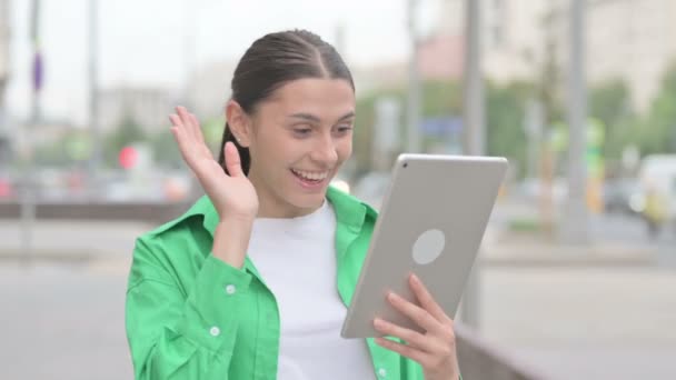 Video Call on Tablet by Young Woman Outdoor - Materiał filmowy, wideo