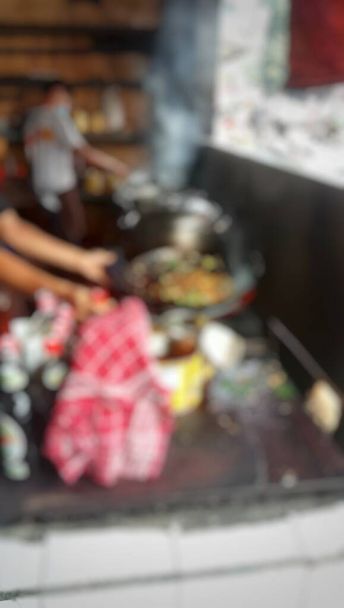Размытый процесс приготовления лапши в ресторане. Абстрактный фон - Фото, изображение