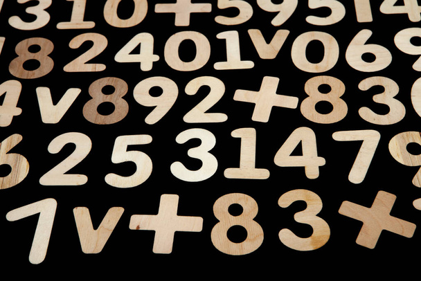 Colorful wooden colorful numbers background. Numbers texture abstraction. Global economy crisis concept  - Foto, immagini