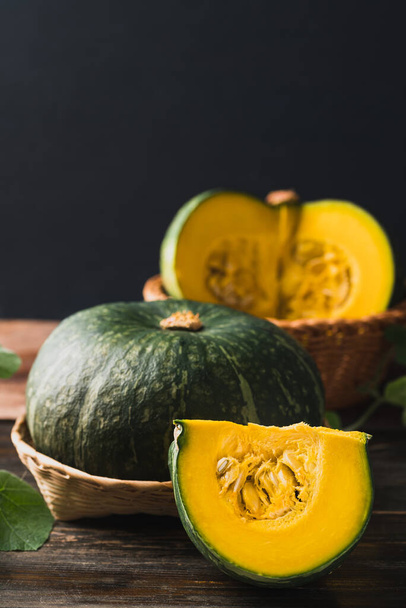 Green pumpkin on wooden background, Organic vegetable - Foto, Imagen