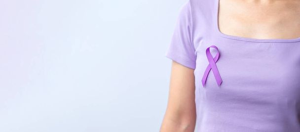 purple Ribbon for Violence, Pancreatic, Esophageal, Testicular cancer, Alzheimer, epilepsy, lupus, Sarcoidosis and Fibromyalgia. Awareness month and World cancer day concept - Fotoğraf, Görsel