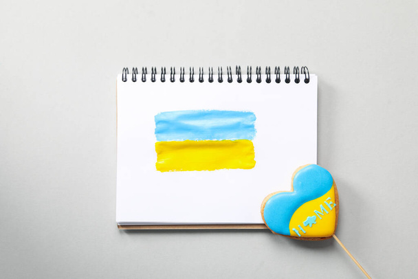 Composition for concept Save Ukraine on light gray background, top view - Фото, изображение