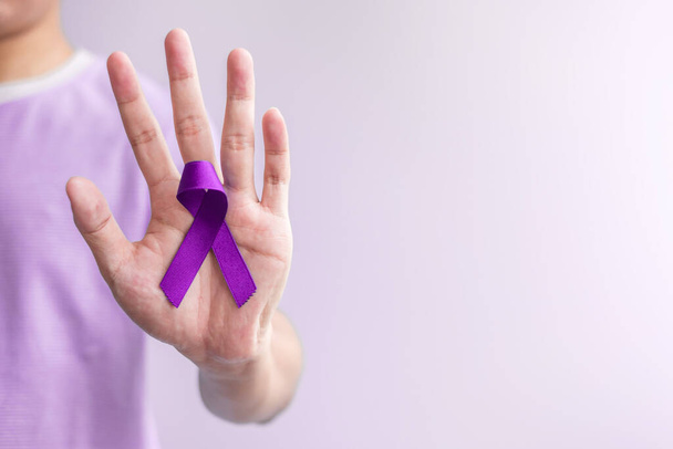 purple Ribbon for Violence, Pancreatic, Esophageal, Testicular cancer, Alzheimer, epilepsy, lupus, Sarcoidosis and Fibromyalgia. Awareness month and World cancer day concept - Fotoğraf, Görsel