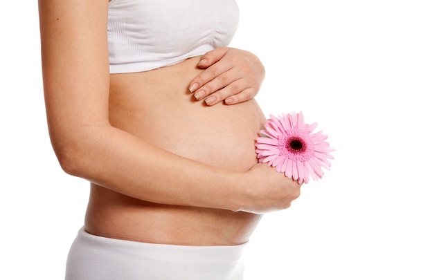 Schwangere mit Blume - Foto, Bild