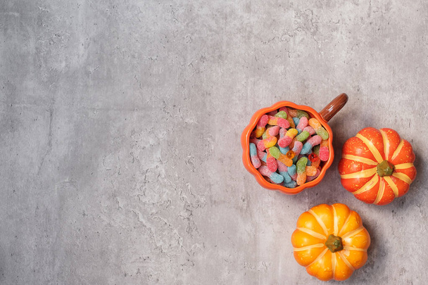 Happy Halloween day with ghost candies, pumpkin,  bowl and decorative. Trick or Threat, Hello October, fall autumn, Festive, party and holiday concept - Foto, afbeelding