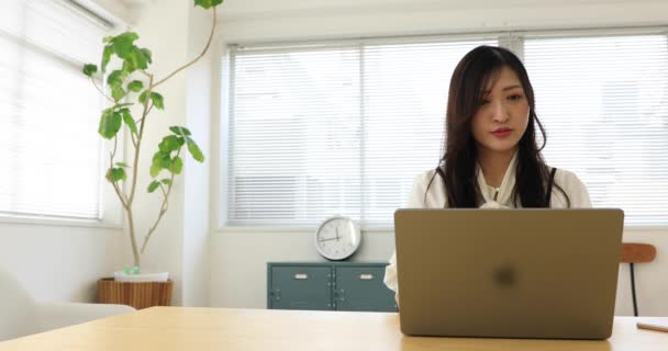 Tokyo Japan 06.19.2022. This working scene is acted by Japanese model in the office. High quality 4k footage - Filmati, video