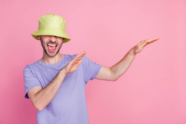 Photo of satisfied guy eyes hidden enjoy summer holiday disco trendy head accessory empty space isolated on pink color background. - Foto, afbeelding