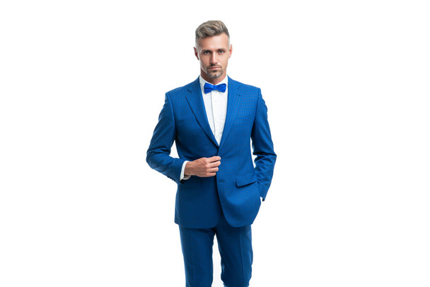 confident man bridegroom in blue rich tux bow isolated on white background. - Photo, Image
