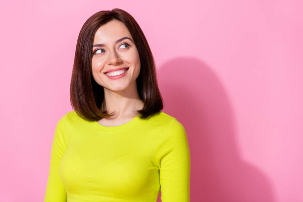 Portrait of charming cheerful person beaming smile look empty space isolated on pink color background. - Foto, Imagen
