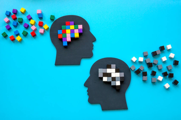 Positive and negative mindset concept. Heads with small colorful cubes. - Photo, image