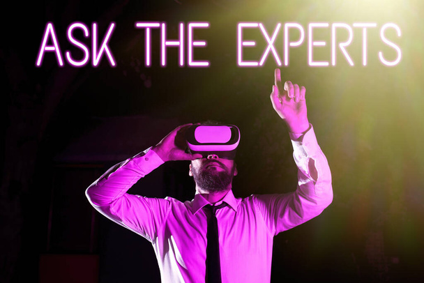 Handwriting text Ask The Experts, Internet Concept Look for a professional advice consultation support Businessman Using Virtual Reality Simulator And Gesturing During Training. - Fotografie, Obrázek