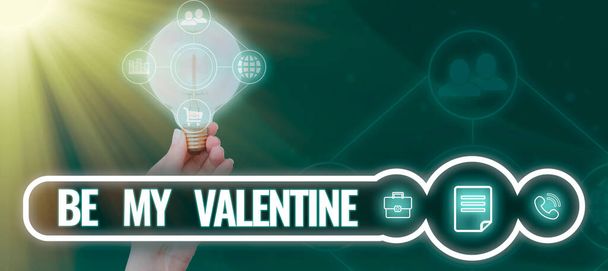 Hand writing sign Be My Valentine, Conceptual photo Proposal to go on a date on February 14 romantic feelings Woman Holding Light Bulb With Multiple S Introducing New Ideas. - Fotó, kép