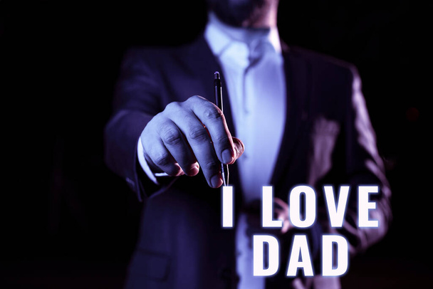 Handwriting text I Love Dad, Word Written on Good feelings about my father Affection loving happiness Businessman Pointing Important Informations With Pen In Hand. - Photo, Image