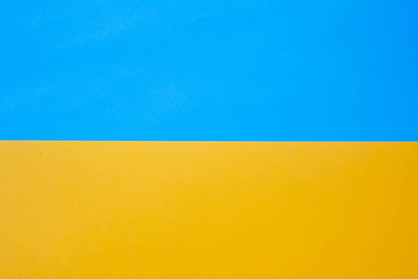 Yellow and blue paper texture. Flag of Ukraine made of colored paper. Independence day blank greeting card. Mock up, copy space - Photo, image