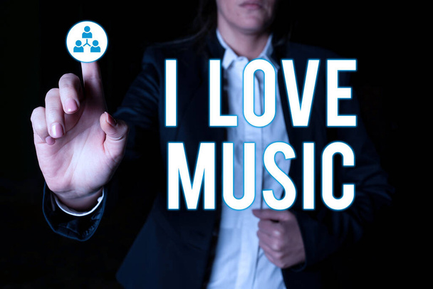 Hand writing sign I Love Music, Business showcase Έχοντας αγάπη για τους καλούς ήχους λυρικοί τραγουδιστές μουσικοί Επιχειρηματίας επισημαίνοντας σημαντικές προσβολές με ένα δάχτυλο. - Φωτογραφία, εικόνα